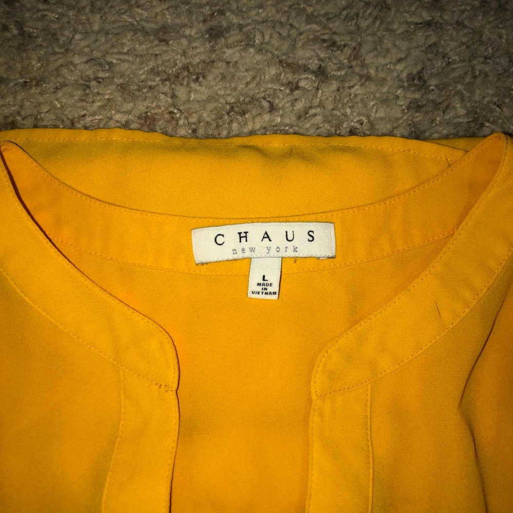 Yellow sleeveless top